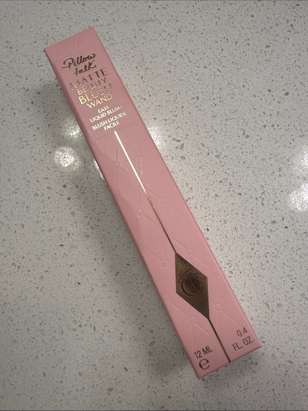 Charlotte Tilbury Matte Beauty Blush Wand and pillow talk.